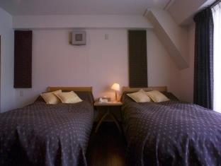 Tabiyu Abrigo Aparthotel Kobe Quarto foto