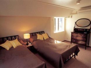 Tabiyu Abrigo Aparthotel Kobe Quarto foto